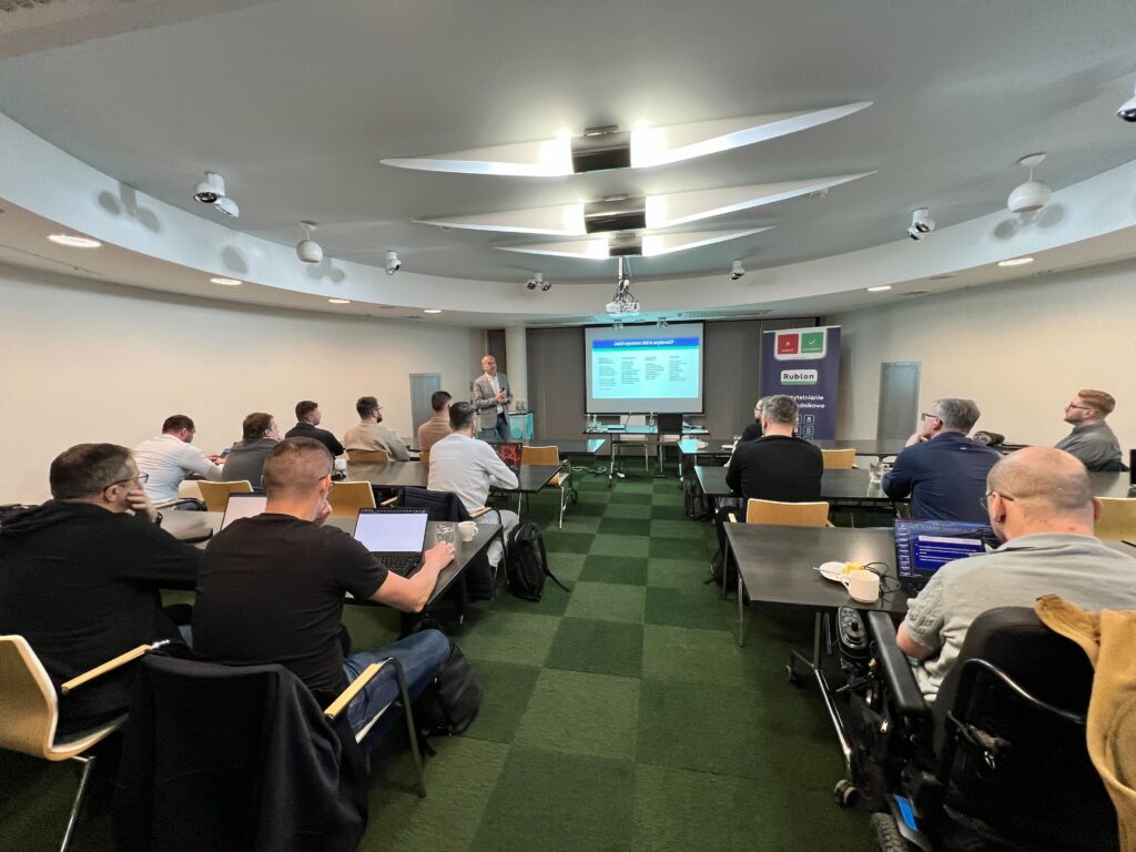Przemyslaw Kucharzewski opened the training by discussing the MFA system and its role in securing business technologies.